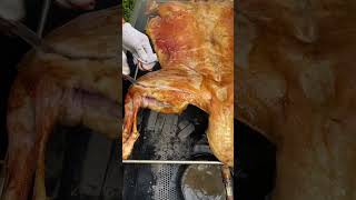 Roasted whole lamb is golden in color carne asado comida delicioso [upl. by Jung]