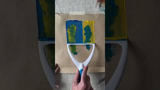 Acrylic paint mixing with a squeegee on a cardboard box [upl. by Lane]