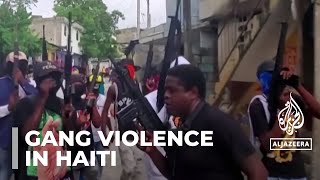 Haiti attack Armed groups kill at least 70 people in central [upl. by Aisemaj]