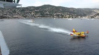 Water Bombers load up next to cruise liner [upl. by Enaz]