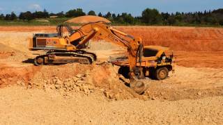 R974B Liebherr loading 770 CAT Valerian [upl. by Kronfeld]