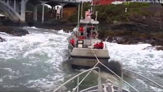 Coast Guard Station Depoe Bay lifeboat tows another lifeboat through quotThe Holequot [upl. by Treiber]