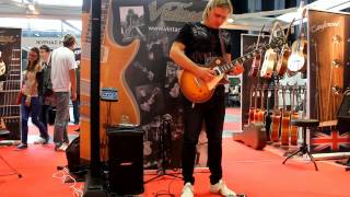 Dmitry Andrianov plays on Vintage V100MRTSB on Musikmesse Russia 2014 [upl. by Asihtal]