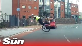 Hapless bike cop goes FLYING over the handlebars [upl. by Obeng]