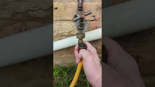 How to prime a garden hose to siphon water [upl. by Sudnac]