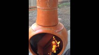 Chiminea or Kiva fire my first one in the new clay chimney outdoor fireplace [upl. by Diahann]