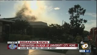 Firefighters on roof of University City home [upl. by Gabey]