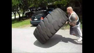 Seth Fromberg 945 lbs Tire Flip [upl. by Yllak]