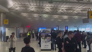 VIDEO Escalator catches fire at JFK Airport in New York [upl. by Blondy]