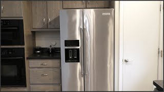 Replacing A KitchenAid Refrigerator Water Filter [upl. by Channa]