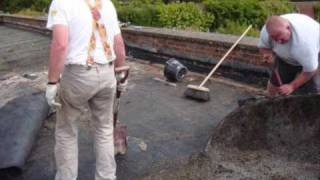 Old felt flat roof being replaced with a new EPDM Rubber roof [upl. by Yarrum]