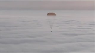 Soyuz TMA18M Lands after Year in Space Mission [upl. by Ajit]