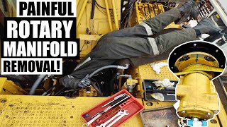 EXCAVATOR ROTARY MANIFOLD REMOVAL MADE EASY  CAT 320D FM  part 2 [upl. by Halliday]