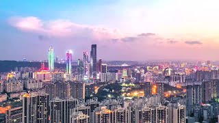 A birds eye view of Nanning GuangxiChinaAerial views of Nanning skyline daynight [upl. by Tierza]