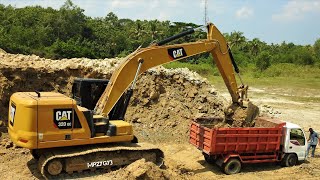 Excavator Loading Dump Trucks CAT 320GC Next Generation Digger Earthmover [upl. by Thedrick]