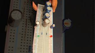 How do parallel capacitors store electric chargeselectronics capacitors circuits experiment diy [upl. by Munmro720]