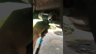 Sunex SX4350 Air impact wrench versus Ford E250 radius arm nut [upl. by Buhler456]