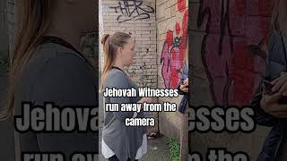 Jehovah Witnesses refuse to answer any questions and run away from the camera rome [upl. by Silvie969]