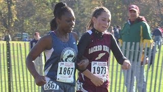 Cross country runner helps competitor finish race [upl. by Nanam189]