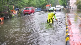 Unclogging Drains to Drain Floods Draining Streets After Heavy Rains [upl. by Rowe]