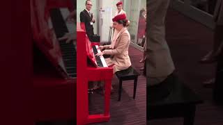 Emirates girl playing pianoaviation emirates piano ytshort [upl. by Yahiya]