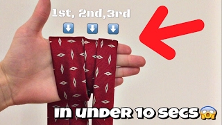 how to TIE A TIE IN 10 seconds easy method [upl. by Zurkow]