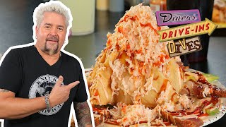 Guy Fieri Eats a Seafood Volcano in New Orleans  Diners DriveIns and Dives  Food Network [upl. by Adoh141]