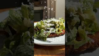 A classic turned around 🥗✨🔄 Caesar salad ON a chicken Schnitzel shorts recipe recipeideas [upl. by Aseram967]