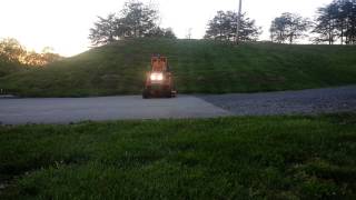 Mowing a Steep Hill with the BX [upl. by Gnat]