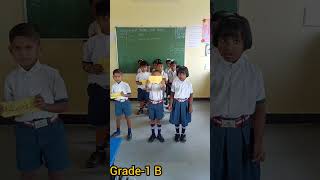 Grade 1 kannada poem song activity groupsong class students [upl. by Aicinoid97]