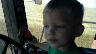 2 year old operating Case IH 2588 combine [upl. by Ahtekal73]