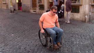 Wheelchair on Rome cobblestones  wwwSageTravelingcom [upl. by Aihtela]