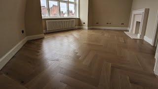 Light oak oversized herringbone parquet installation Maida Vale W9 [upl. by Urbannai212]