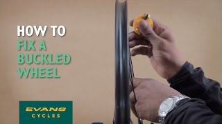 How to fix a buckled wheel [upl. by Thoer]