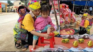 single mother and adopted child go to the market to buy tet food [upl. by Nnaxor]