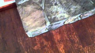 How to cut laminate flooring next to a stone fireplace [upl. by Aled]