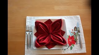 How to Fold a Napkin in a Christmas Poinsettia [upl. by Aknahs]