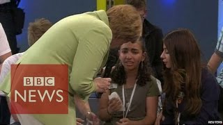 Angela Merkel criticised over crying refugee  BBC News [upl. by Nerin]