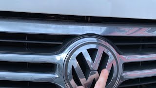 How to open and close your car hood VW Tiguan DIY [upl. by Eelak]