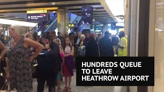 Massive queue forms at Heathrow exit as passengers are told to leave airport [upl. by Ymer]