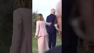 Biden appears to wander off at G7 summit before being pulled back by Italian PM shorts [upl. by Annat211]