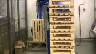 Motoman robot nailing timber pallets [upl. by Aihsenat81]