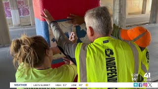 Sheffield neighborhood volunteers spruce up paint clean up litter at 9th amp Hardesty underpass mural [upl. by Irita659]