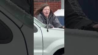 WATCH Woman aggressively scraping ice off car shorts [upl. by Aalst854]