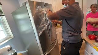 How to install an LG French door Refrigerator and freezer [upl. by Hcardahs493]