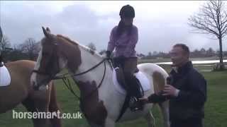 Richard Dunwoody teaches Strictlys Lilia Kopylova how to ride a horse [upl. by Wahs]