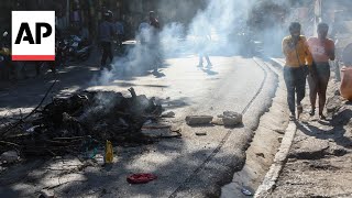 Bodies lie in the street after Haiti neighborhood targeted in gang attacks [upl. by Adnert]