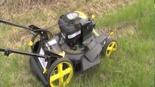 Brute lawn mower tackles tall grass [upl. by Eniledgam]