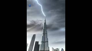 Heavy rain in Dubai Thunder hits the Burj Khalifa many times [upl. by Kissee]