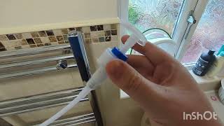 Add inhibitor to central heating system via a Towel Rail  drain using a soap pump [upl. by Elbertine]